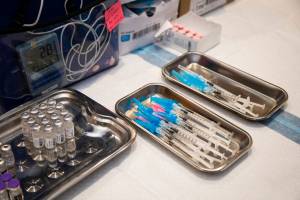 COVID vaccine doses at a vaccination site at a shopping mall in Bayamn, Puerto Rico, Jan. 7, 2022. The FDA has approved updated Covid vaccines for the fall 2025 season that limit who can get the shots, the federal governments most restrictive policy since the vaccines became available. (Erika P. Rodriguez/The New York Times)