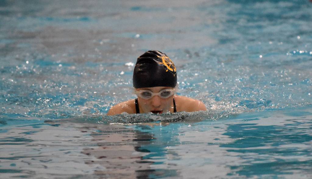 Homers Ila Sylce competes in the 100-breaststroke Friday, Aug. 29, 2025, at Kenai Central High School in Kenai, Alaska. (Photo by Jeff Helminiak/Peninsula Clarion)