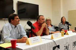 Henry Knackstedt, Alex Douthit, Victoria Askin and Bridget Grieme participate in a forum with candidates for Kenai mayor and city council at the Kenai Community Library in Kenai, Alaska, on Thursday, Sept. 4, 2025. (Jake Dye/Peninsula Clarion)