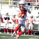 Kenai junior Kyron Gonzalez makes a catch near midfield during a 31-22 win over Houston on Friday, Sept. 5 at Houston High School in Houston, Alaska. (Photo by Jeremiah Bartz/Frontiersman)