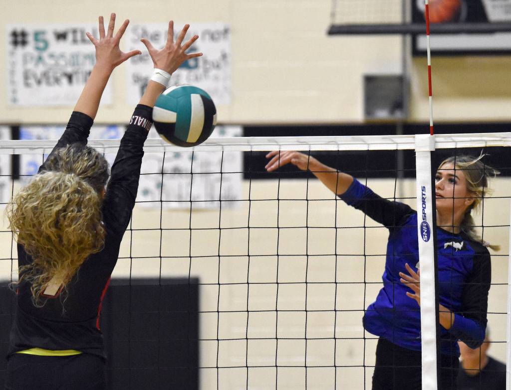 Palmers Khloe Ivey attacks against Kenai Centrals Sophie Tapley on Saturday, Sept. 6, 2025, at the 18th annual Shayna Pritchard Memorial Volleyball Tournament at Nikiski Middle-High School in Nikiski, Alaska. (Photo by Jeff Helminiak/Peninsula Clarion)