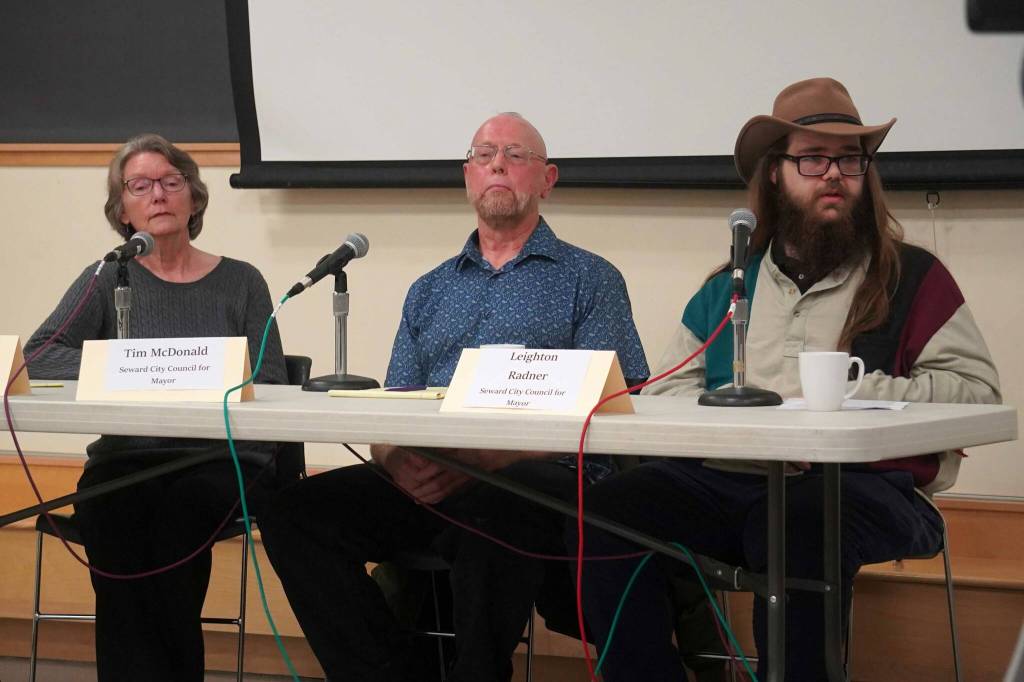 Incumbent Sue McClure and challengers Tim McDonald and Leighton Radner, the three candidates for Seward mayor, participate in a forum at the Seward Community Library in Seward, Alaska, on Thursday, Sept. 11, 2025. (Jake Dye/Peninsula Clarion)