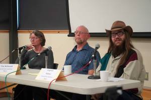 Incumbent Sue McClure and challengers Tim McDonald and Leighton Radner, the three candidates for Seward mayor, participate in a forum at the Seward Community Library in Seward, Alaska, on Thursday, Sept. 11, 2025. (Jake Dye/Peninsula Clarion)