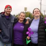 Staff from Aspen Creek Senior Living stand for a photo during the Third Annual Kenai Peninsula Walk to End Alzheimers on North Tinker Lane in Kenai, Alaska, on Saturday, Sept. 13, 2025. (Jake Dye/Peninsula Clarion)
