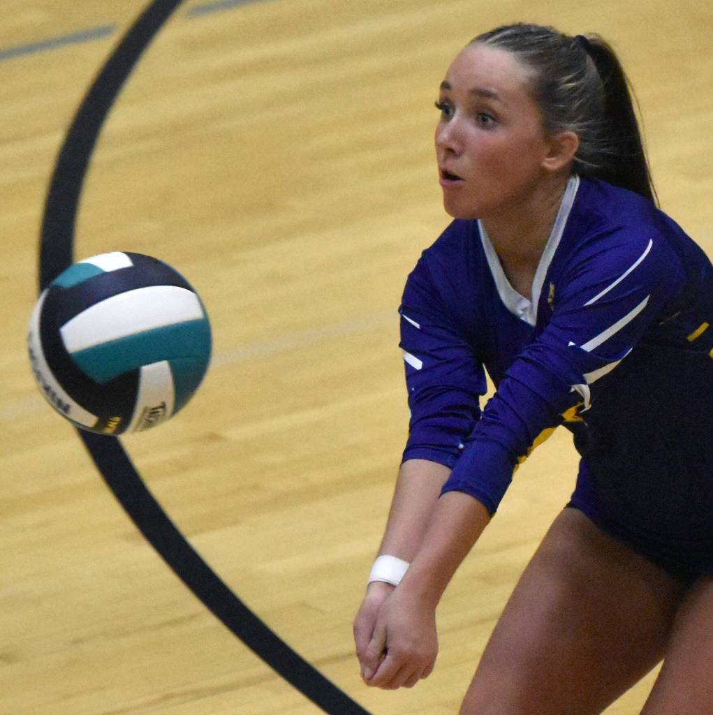Homers Piper Fuchs digs up a ball against Nikiski on Tuesday, Sept. 23, 2025, at Nikiski Middle-High School in Nikiski, Alaska. (Photo by Jeff Helminiak/Peninsula Clarion)