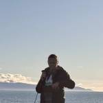 Cassie Lawver reads from a prepared script on Wednesday, Sept. 17, 2025, at a vigil for Charlie Kirk at Mariner Park on the Homer Spit in Homer, Alaska. (Chloe Pleznac/Homer News)