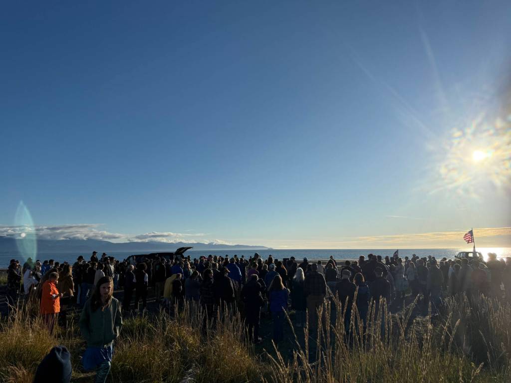 A crowd gathers at Mariner Park on the Homer Spit in Homer, Alaska, to honor Charlie Kirk on Wednesday, Sept. 17, 2025. Kirk was shot and killed on Sept. 10. (Chloe Pleznac/Homer News)