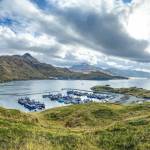 Vessels in the Bering Sea commercial crab fishing fleet are seen in Dutch Harbor in October of 2020 as they undergo preparations for that years harvest. The North Pacific Fishery Management Council is scheduled this week to discuss the condition of snow crab and king crab stocks and make harvest recommendations, but a federal government shutdown may interfere with that and other council work. (Photo by Petty Officer 2nd Class Holly Hugunin/U.S. Coast Guard)