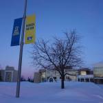 Sunset hues color the sky and the snow at the University of Alaska Fairbanks campus on Feb. 26, 2024. The University of Alaska system and the union representing nearly 1,100 faculty members and postdoctoral fellows are headed into federal mediation in January. (Yereth Rosen/Alaska Beacon)