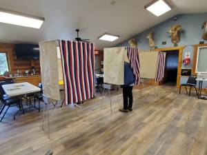 A voter fills out their ballot on Election Day, Tuesday, Oct. 7, 2025, at the Anchor Point Community and Senior Center in Anchor Point, Alaska. (Delcenia Cosman/Homer News)