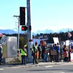More than 700 protesters line the sidewalks along the intersection of Lake Street and Sterling Highway during the "No Kings" demonstration on Saturday, Oct. 18, 2025, in Homer, Alaska. (Delcenia Cosman/Homer News)