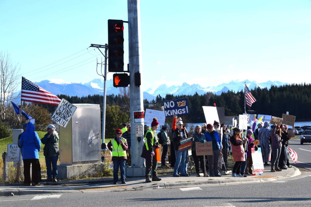 More than 700 protesters line the sidewalks along the intersection of Lake Street and Sterling Highway during the No Kings demonstration on Saturday, Oct. 18, 2025, in Homer, Alaska. (Delcenia Cosman/Homer News)