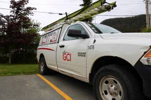 A GCI Communications truck is parked at the companys Juneau office. (Clarise Larson / Juneau Empire)