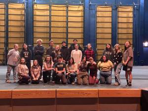 The cast of Kenai Central High School’s upcoming production of “A Midsummer Night’s Dream” pose for a photo on Nov. 6, 2025. The play will open on Nov. 14 at 7 p.m. Photo courtesy of Travis Lawson