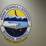The logo for the Kenai Peninsula Borough School District is displayed inside the George A. Navarre Borough Admin Building on Thursday, July 22, 2021 in Soldotna, Alaska. (Ashlyn O’Hara/Peninsula Clarion)