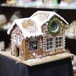 A decorated gingerbread house awaits judgment in the Kenai Chamber of Commerce on Monday<ins>, Nov. 24, 2025</ins>. This year marks the 13th annual gingerbread house contest, and submissions are open until Dec. 8.