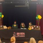 Sophie Tapley is photographed with her parents, Josh and Whitney Tapley, during Sophies signing ceremony at Kenai Central High School on Nov. 26, 2025. Tapley committed to playing volleyball at the University of Alaska Anchorage during the 2026-2027 school year. Photo courtesy of Jesse Settlemyer, Kenai Central Athletics