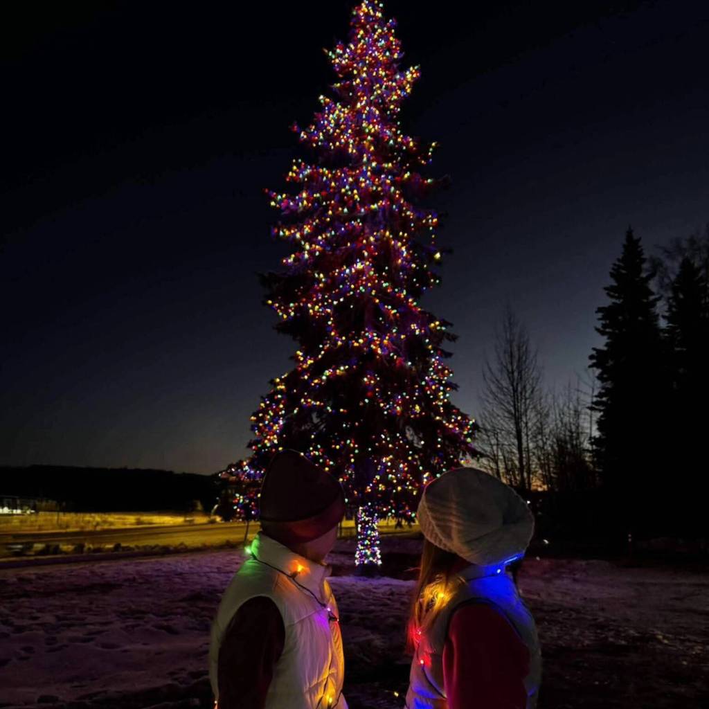 Photo courtesy of the Soldotna Chamber of Commerce
Community members view the the lighting of a 70-foot-tall tree near the Soldotna Chamber of Commerce on Friday, Dec. 12. The chamber was forced to cancel the annual Christmas in the Park event, originally scheduled for Dec. 6, due to high winds and freezing temperatures. Chamber executive director Heidi Sorrell said that over 500 people attended this years Holiday Christmas Tree Lighting.