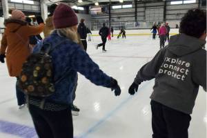 Community members enjoy skating at Kevin Bell Arena during the Christmas Eve community free skate on Wednesday, Dec. 24, 2025, in Homer, Alaska. (Delcenia Cosman/Homer News)