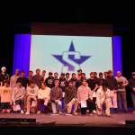 The Soldotna High School varsity football team receives certificates of achievement, presented on Tuesday, Jan. 13, 2026,  by Kenai Peninsula Borough Mayor Peter Micciche (right) and KPB Assembly member Sargeant Truesdell, for winning the Division II State Championship in October 2025. Photo courtesy Joe Rizzo