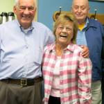 Photo by Ned Rozell
At the Elvey Building, home of UAFs Geophysical Institute, Carl Benson, far right, and Val Scullion of the GI business office attend a 2014 retirement party with Glenn Shaw.