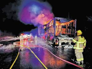 Cooper Landing Fire and Emergency Medical Services respond to a trailer fire on Tuesday, April 26, 2022, near Mile 38 Seward Highway near Cooper Landing, Alaska. The fire destroyed the trailer carrying U.S. Mail from Anchorage to the Southern Kenai Peninsula. (Photo courtesy of Cooper Landing Fire and EMS)