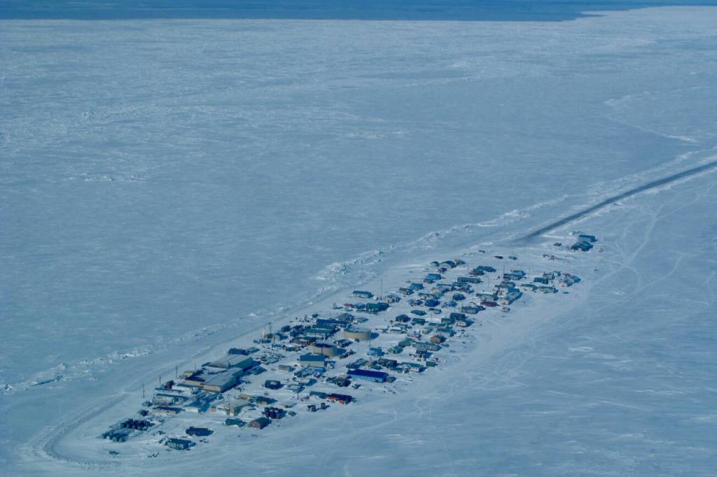 Northern sea ice, such as this surrounding the community of Kivalina, has declined dramatically in area and thickness over the last few decades. Photo courtesy Ned Rozell