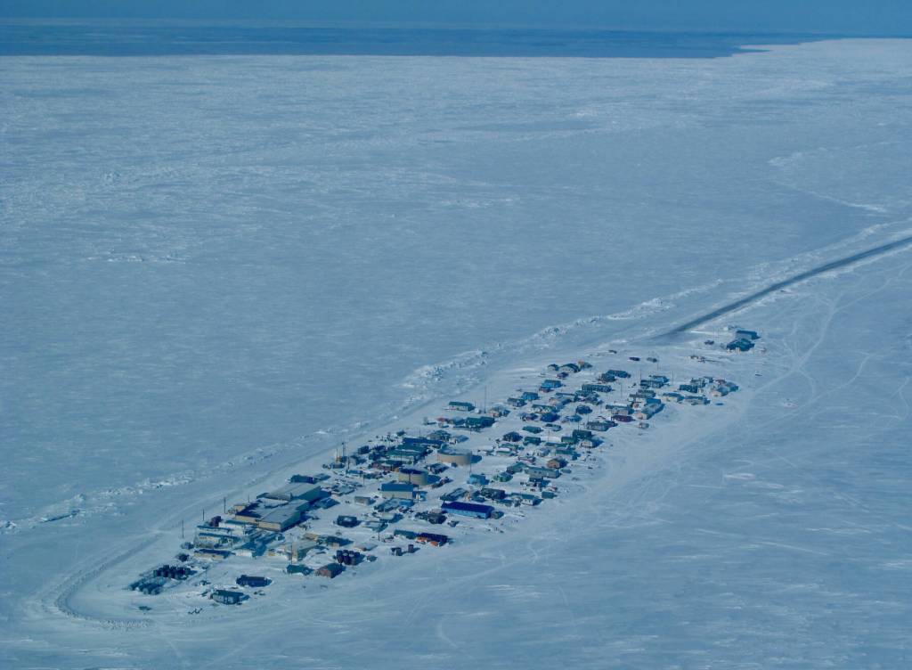 Northern sea ice, such as this surrounding the community of Kivalina, has declined dramatically in area and thickness over the last few decades. Photo courtesy Ned Rozell