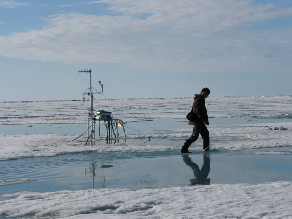 Hajo Eicken walks the sea ice off the town of Utqiaġvik in about 2010. Photo courtesy Matt Druckenmiller