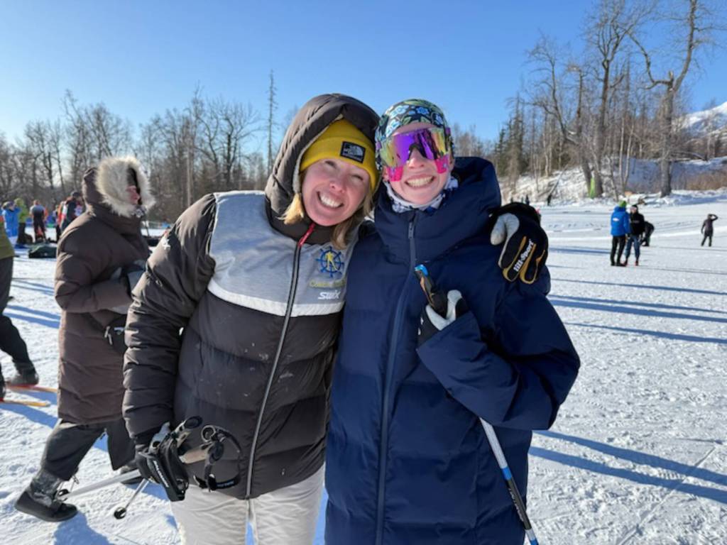 Homer High School head coach Jessie Goodrich and freshman Freya Bartlett pose for a photo during the ASAA Nordic Ski State Championships held Feb. 19-21<ins>, 2026,</ins> in Wasilla<ins>, Alaska</ins>. Photo provided by Jessie Goodrich