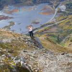 Hiker Mike Crawford poses high above Tern Lake in 2011. (Photo by Clark Fair)