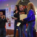Rox Shafer (center) receives the Youth of the Year award during the Community Awards presentation on Saturday, Feb. 28<ins>, 2026</ins> at the Angry Salmon in Anchor Point<ins>, Alaska</ins>. (Delcenia Cosman/Homer News)