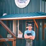Owner Johnny Brennand-Sheffler is photographed outside Johnnys Corner on the Homer Spit in Homer, Alaska. Photo courtesy Christopher Kincaid