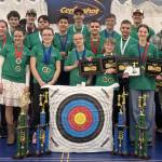 The HisPins-Kenai youth archery team and coaches pose with their many awards following the 2nd annual Alaska Centershot State Tournament, held March 13-14, 2026, in Palmer, Alaska. Photo provided by Rick Johnson