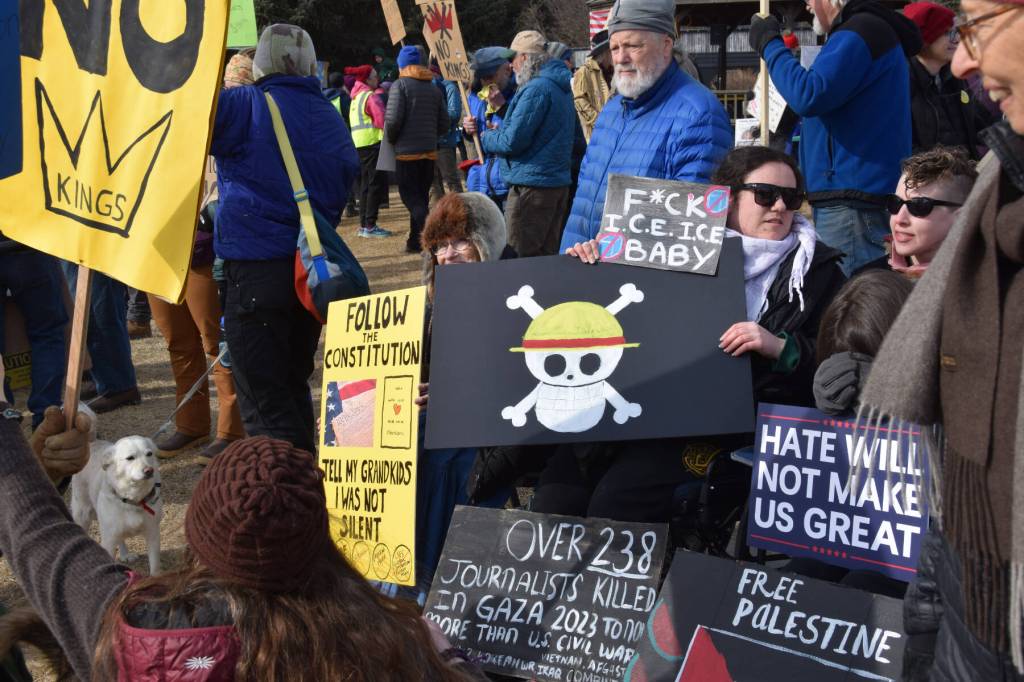 Community members gather at WKFL Park for the third nationally-organized No Kings protest on Saturday, March 28, 2026, in Homer, Alaska. (Delcenia Cosman/Homer News)