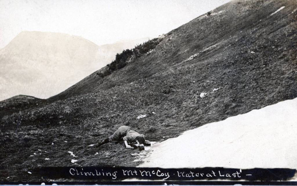 Photo from the Jim Taylor Collection
This postcard photo, circa 1911, is titled Climbing Mt. McCoyWater at Last. Today, this peak in the heart of Cooper Landing is known as Cecil Rhode Mountain.
