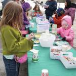 Photo courtesy Merrill Sikorsk
Local youth decorate kids crafts during the annual Kenai Community Egg Hunt, sponsored by the City of Kenai Parks and Recreation and held Saturday, April 4. For the egg hunt itself, members of the Kenai Senior Center and other volunteers assisted in stuffing over 2,000 eggs, and five Kenai residents came out early Saturday morning before the egg hunt to help the Easter Bunny hide them at Kenai Municipal Park.