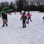 Youth search for colorful eggs against a snowy backdrop during the annual Kenai Community Egg Hunt held Saturday, April 4. Photo courtesy Merrill Sikorski