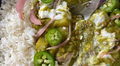 Tressa Dale/Peninsula Clarion Potato and pea lentil curry is perfect served with steamed rice and garnished with Greek yogurt, pickled red onions, and fresh jalapeno.