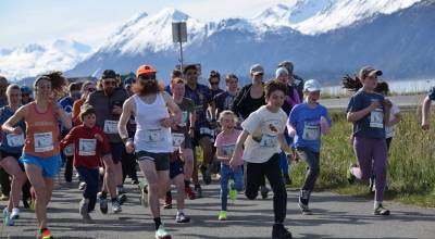 Runners set off from the starting line at the beginning of the 2025 Migration Run on Mothers Day, Sunday, May 11, 2025 on the Homer Spit<ins> in Homer, Alaska</ins>. (Chloe Pleznac/Homer News)