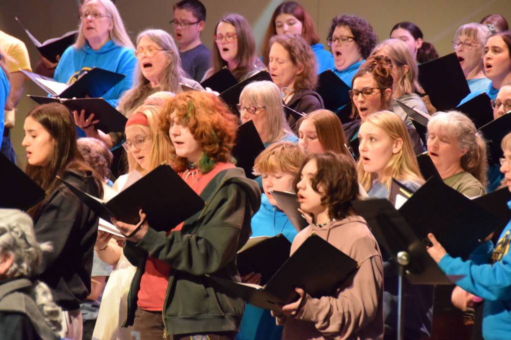 Members of the Homer High School Concert Choir and Kenai Peninsula Community Choir rehearse the Mozart "Requiem" on Thursday, April 30, 2026, on the Homer High School Mariner Theatre stage in Homer, Alaska. (Delcenia Cosman/Homer News)