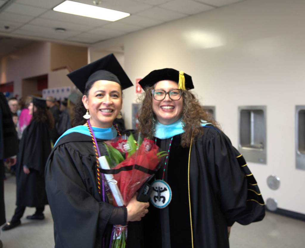 University of Alaska Fairbanks Master of Education candidate Miriam Olivio (left) poses for a photo with Kenai Peninsula College Associate Professor of Early Childhood Education Katie Archer Olson during the Kenai Peninsula College commencement ceremony held Thursday, May 7<ins>, 2026,</ins> at Kenai Central High School<ins> in Kenai, Alaska</ins>. Photo courtesy Summer Lazenby/Kenai Peninsula College