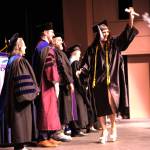Alyssa Koester-Backstrom crosses the stage upon receiving her Associate of Applied Science degree during the Kenai Peninsula College commencement ceremony held Thursday, May 7<ins>, 2026,</ins> at Kenai Central High School<ins> in Kenai, Alaska</ins>. Photo courtesy Summer Lazenby/Kenai Peninsula College