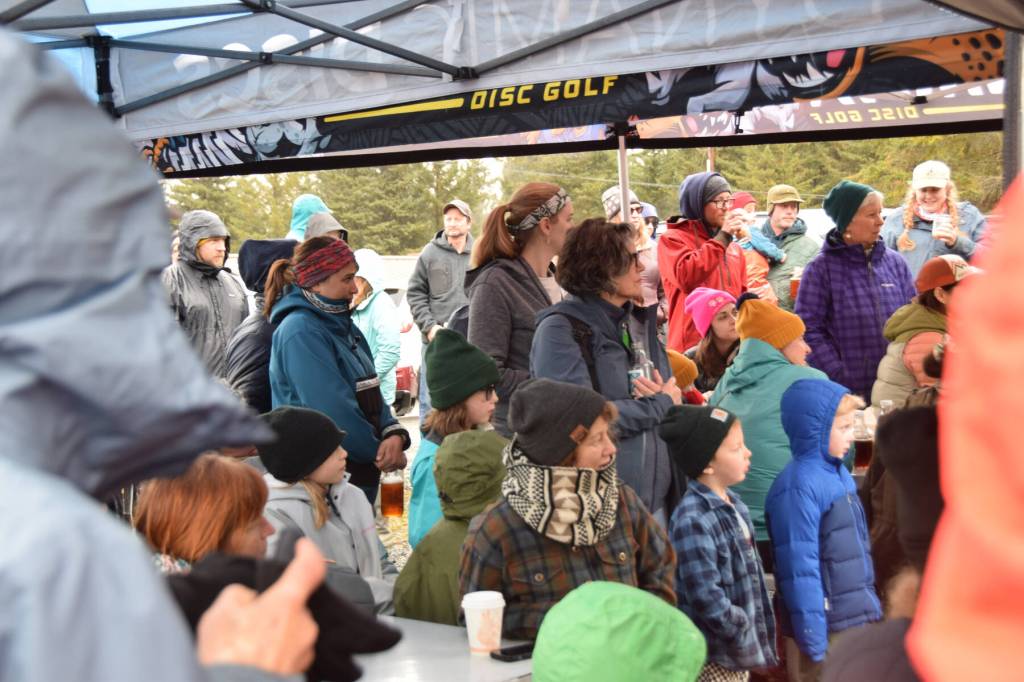 Birders and community members gather under canopies at the Homer Brewing Company for the annual Shorebird Festival bird calling contest on Saturday, May 9<ins>, 2026, in Homer, Alaska</ins>. (Delcenia Cosman/Homer News)