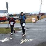 Whitney Harness (right) and Raina Harness compete in the annual Migration Run on Sunday, May 10<ins>, 2026,</ins> on the Homer Spit Trail<ins> in Homer, Alaska</ins>. (Delcenia Cosman/Homer News)