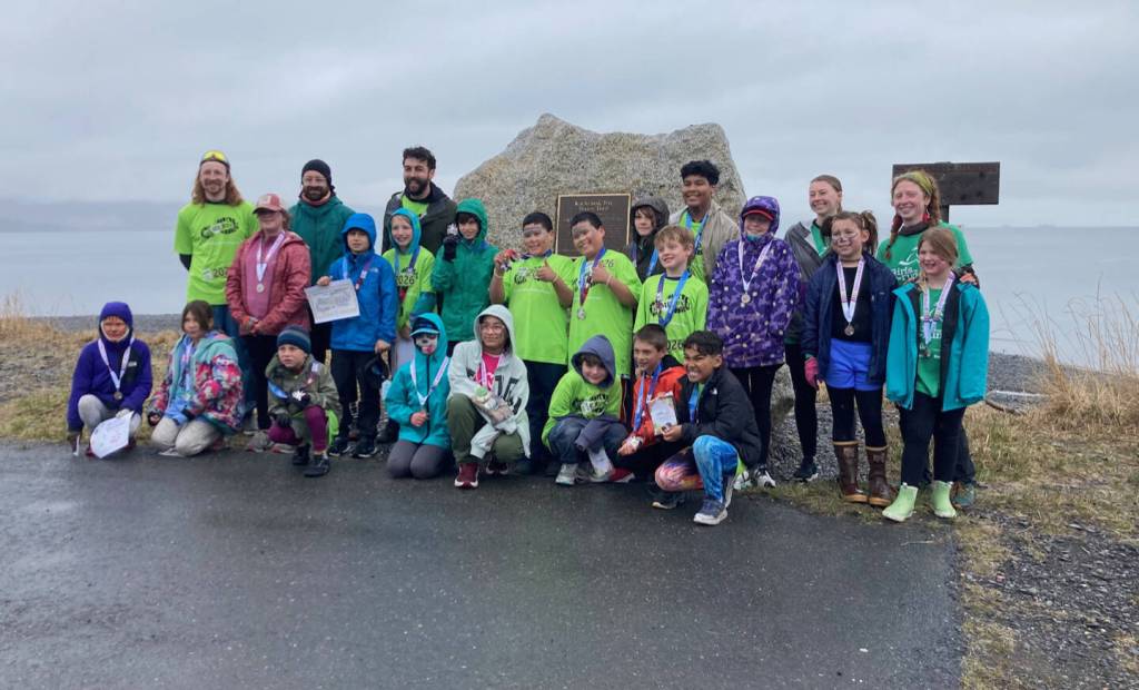 Girls on the Run and Let Me Run program mentors and youth participants pose for a photo after a celebratory 5K race on Sunday, May 10, 2026, on the Homer Spit Trail in Homer, Alaska. Photo courtesy Marcee Gray