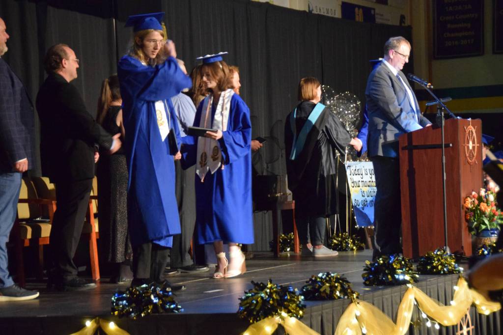 Graduating seniors cross the stage to receive their diplomas during a commencement ceremony on Monday, May 18<ins>,</ins> <ins>2026</ins>, in the Homer High School Alice Witte Gymnasium<ins> in Homer, Alaska</ins>. (Delcenia Cosman/Homer News)