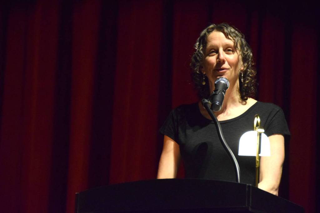 Homer Flex High School counselor Sue Rennolds speaks to the graduating seniors during a commencement ceremony held Monday, May 18<ins>, 2026, in Homer, Alaska</ins>. (Delcenia Cosman/Homer News)