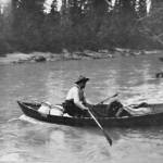By the early 1910s, crossing the Killey River was part of a regular route into moose- and Dall sheep-hunting country, via Skilak Lake. This photo, featuring a hunting guide crossing the river in a collapsible boat, was taken in 1912 and included in Morris L. Parrishs 1913 hunting memoir.