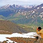 Seen from sheep country in the Kenai Mountains (and looking toward Skilak Lake), the Killey River drainage cuts deep into the terrain and presents an obstacle to travel between Skilak and Tustumena lakes. (Clark Fair photo, 1985)
